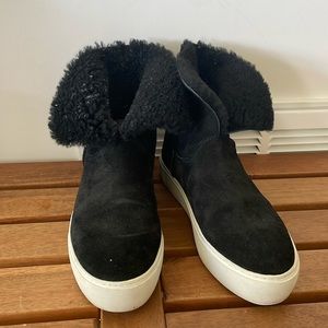 UGG black high top slip on size 8.5 synthetic fur sneakers sole